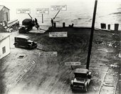 1920s vehicles driving.