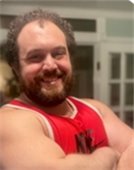 Instructor in red tank top.