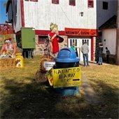 Sign for a haunted barn at a pumpkin festival