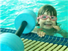 Girl with Swimming Goggles Swimming