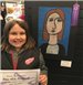Girl Holding Fine Art Festival Certificate by Art with an Excellent Ribbon