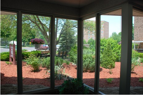 Courtyard view through hallway windows