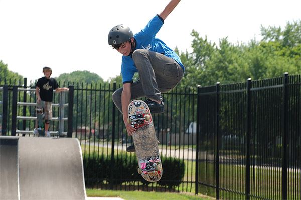 Young man on skate board at the skate park 