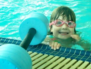 Girl with Swimming Goggles Swimming